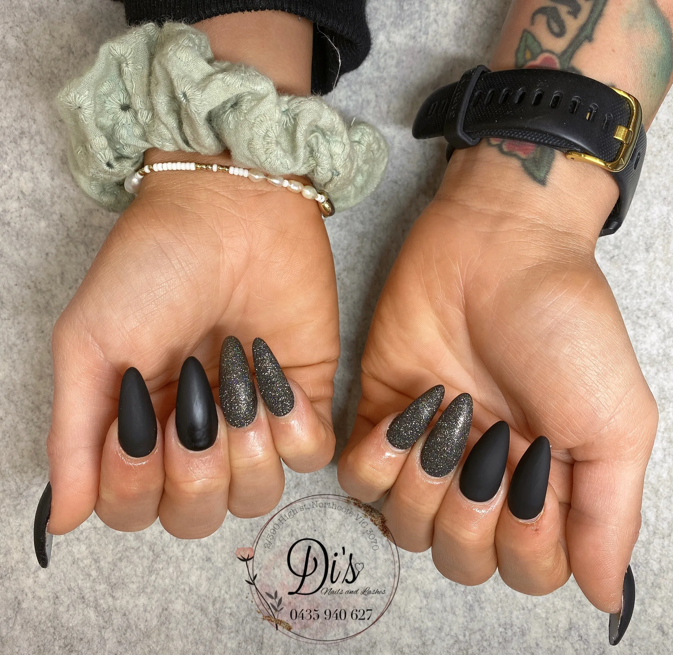 Black matte graphite glitter almond nails, two hands