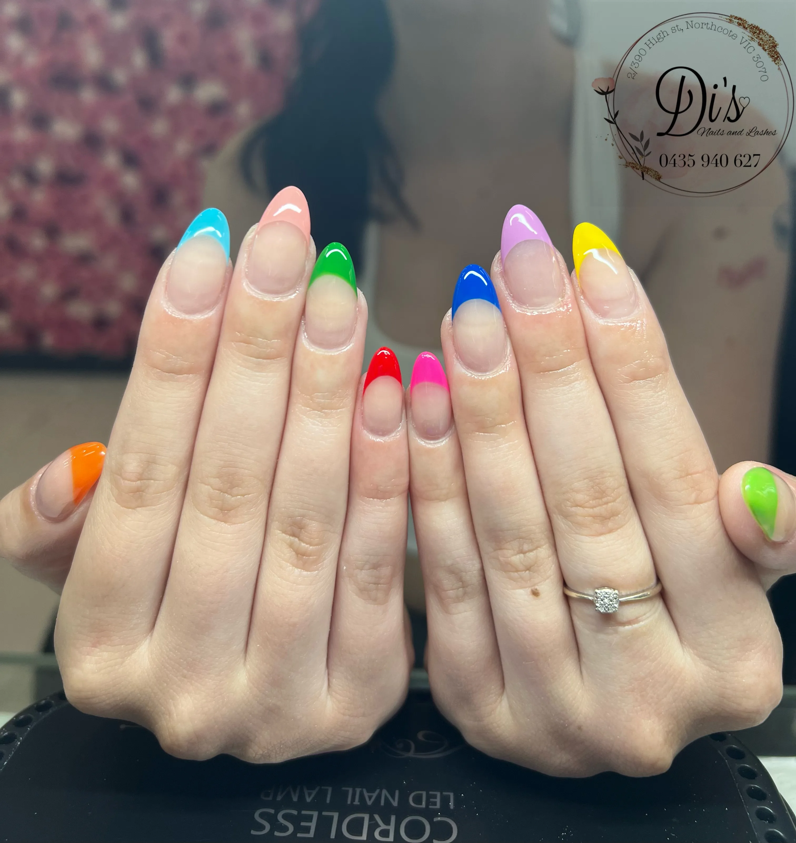 Rainbow pastel French almond nails, each nail a different colour