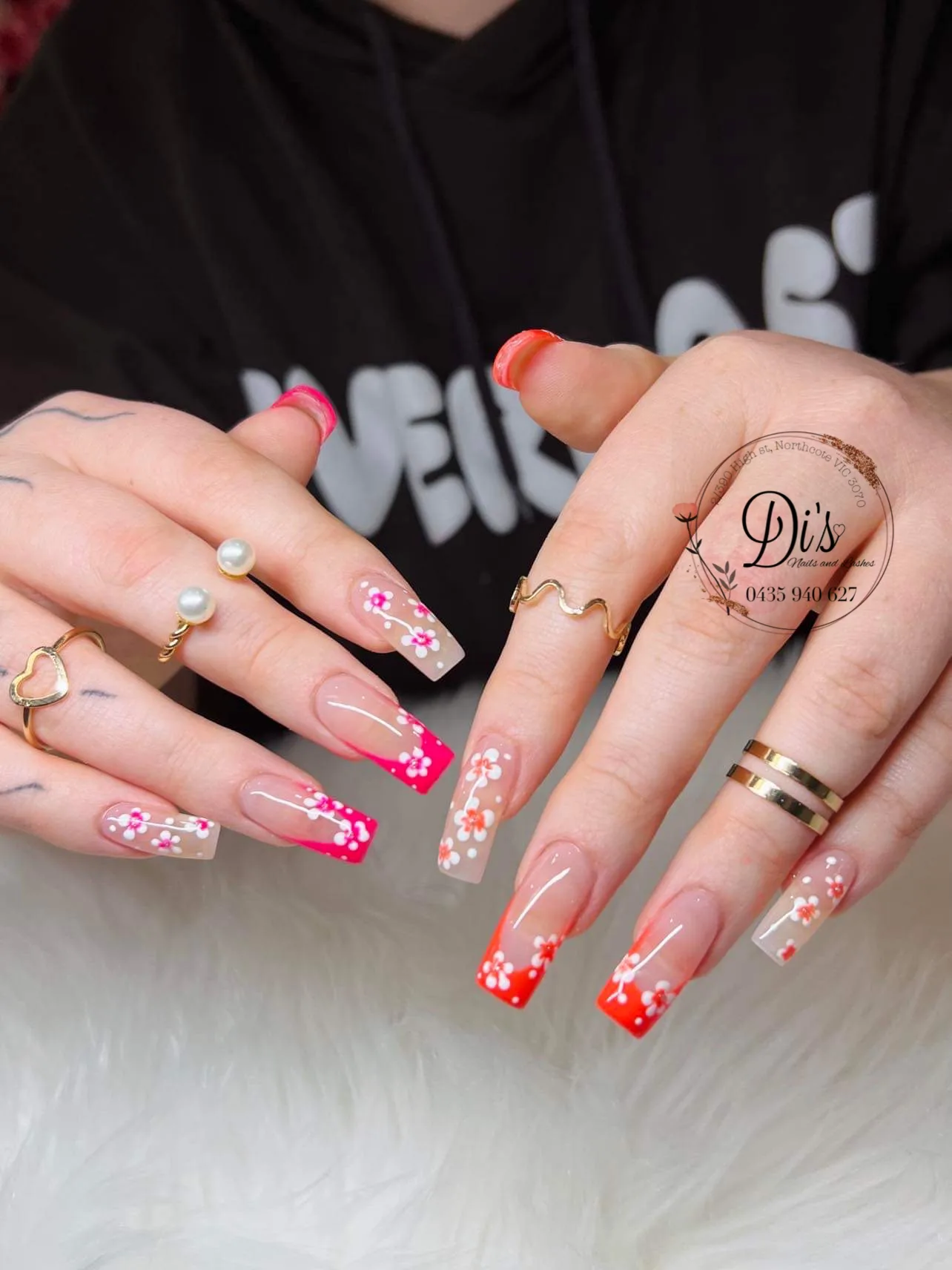 Hand-painted cherry blossom nail art, nude and pink ombré French tips